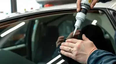 RV windshield replacement in progress
